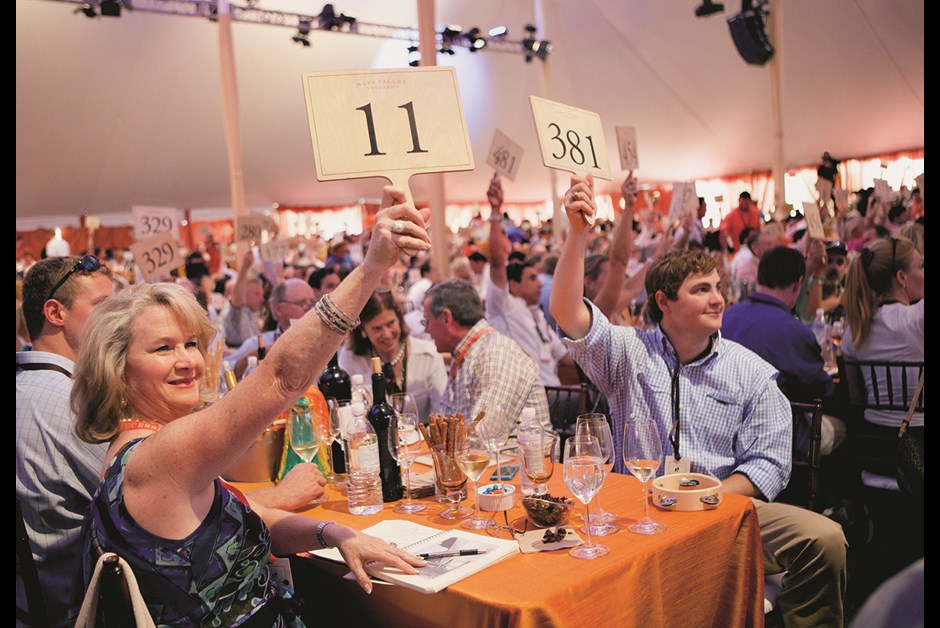 BIDDERS RAISE THEIR PADDLES AT MEADOWOOD